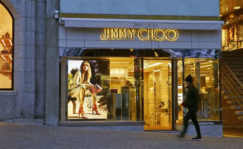 michael kors acquires jimmy choo financial statements|EX.